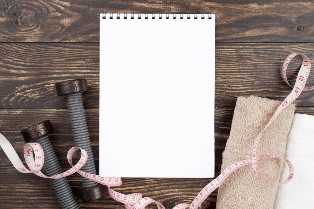 flat lay sport concept with notebook